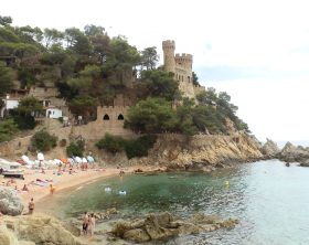 Beach and Castell dEn Plaja at the end of Lloret beach