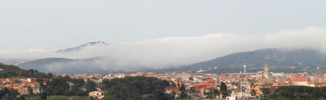 Sea mists in May rolling in over Begur behind Palafrugell